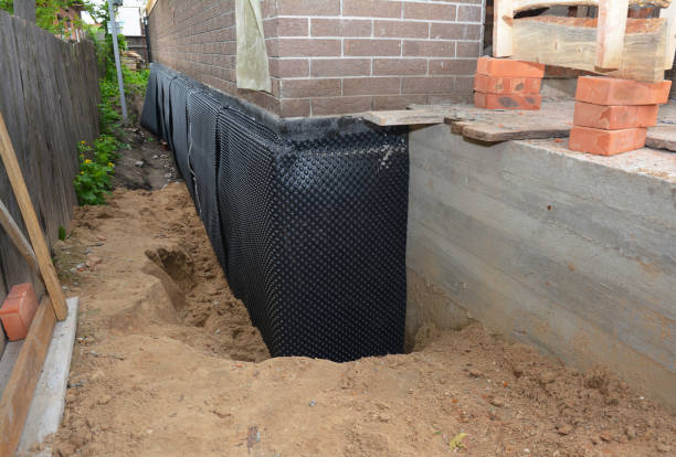 Happy homeowners after waterproofing job in Columbia City